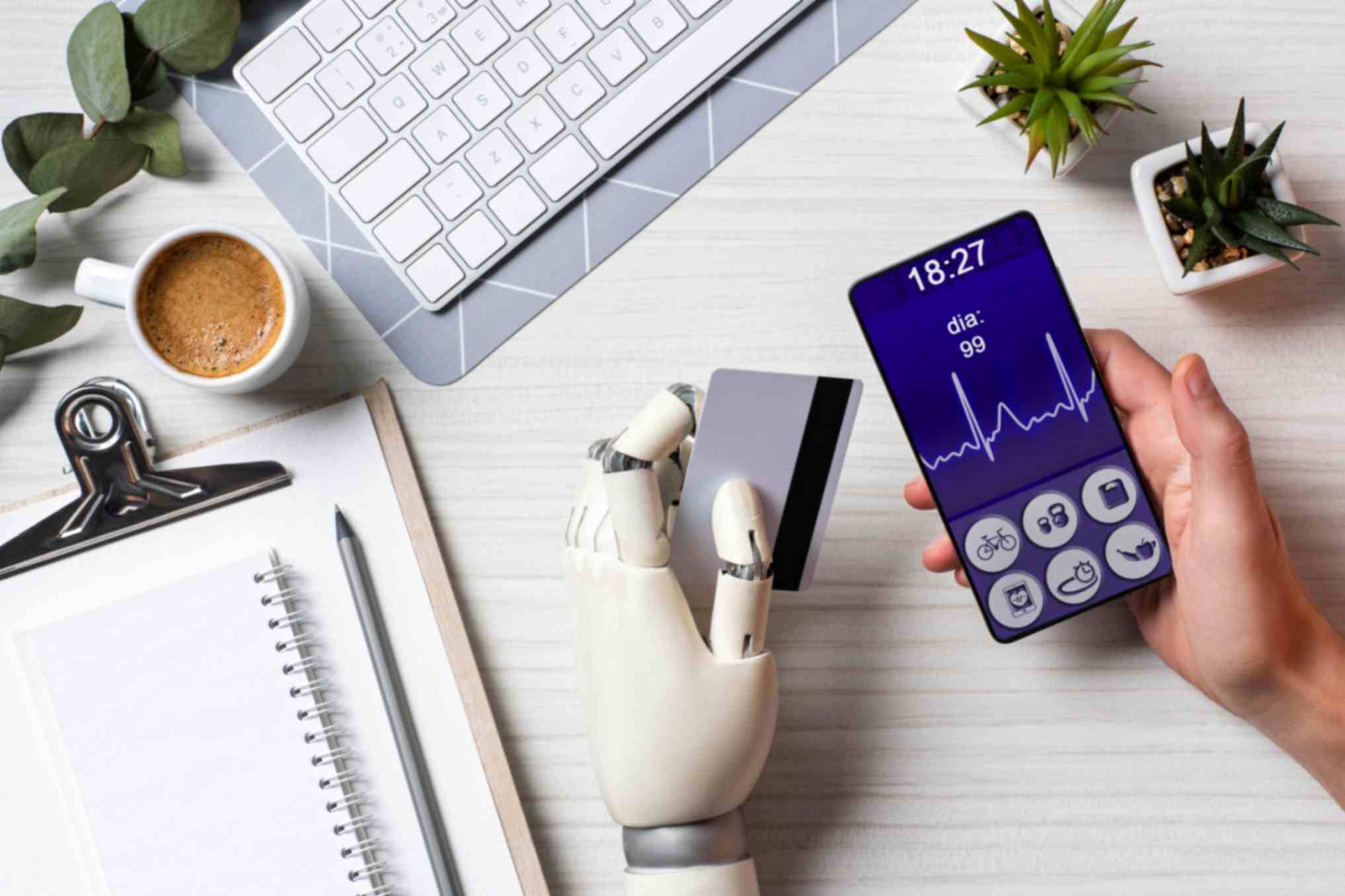 partial-view-of-businessman-with-cyborg-hand-holding